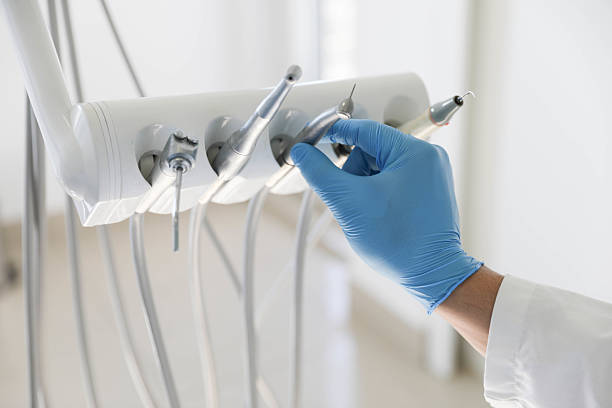 Professional Root Canal Treatment technician working in Moss Bluff, LA